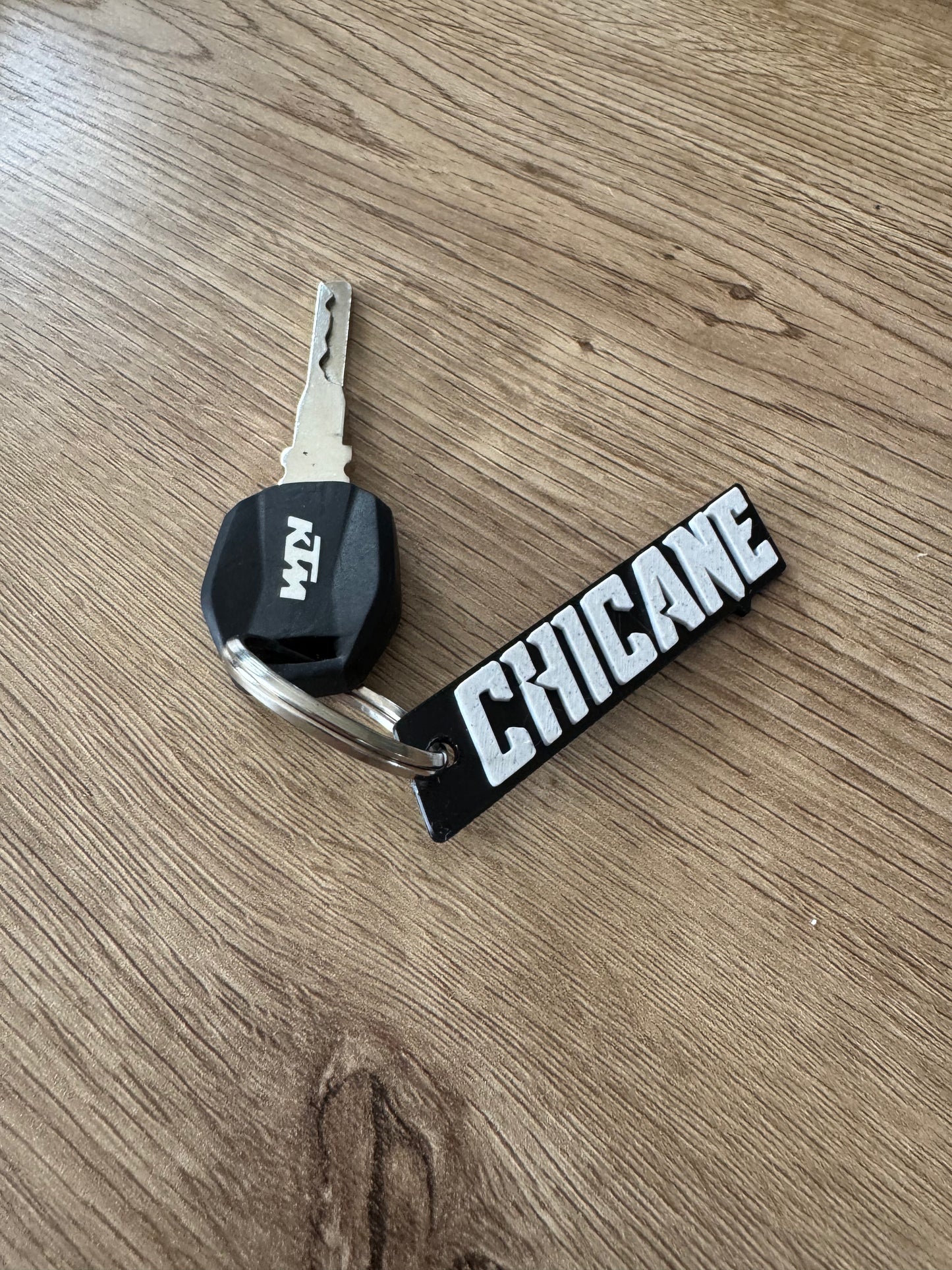 Porte-Clés Chicane 3D – L’empreinte de ton style